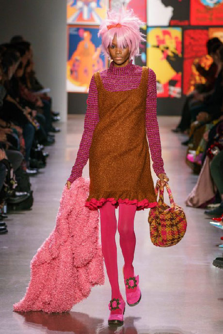 Model wearing the pink Mission Monika on the runway during Anna Sui's Fall/Winter 2019 show.