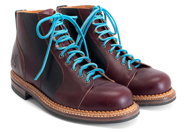 The Fluevog x Viberg Racer boot with blue teal laces.