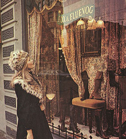 Kecia standing in front of and looking into the Fox & Fluevog store on Granville Street, Vancouver.